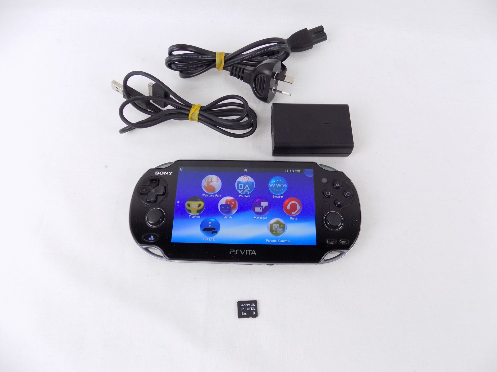 Like New Sony Ps Vita PCH 1000 Oled Console With 4Gb Memory Card + Charger