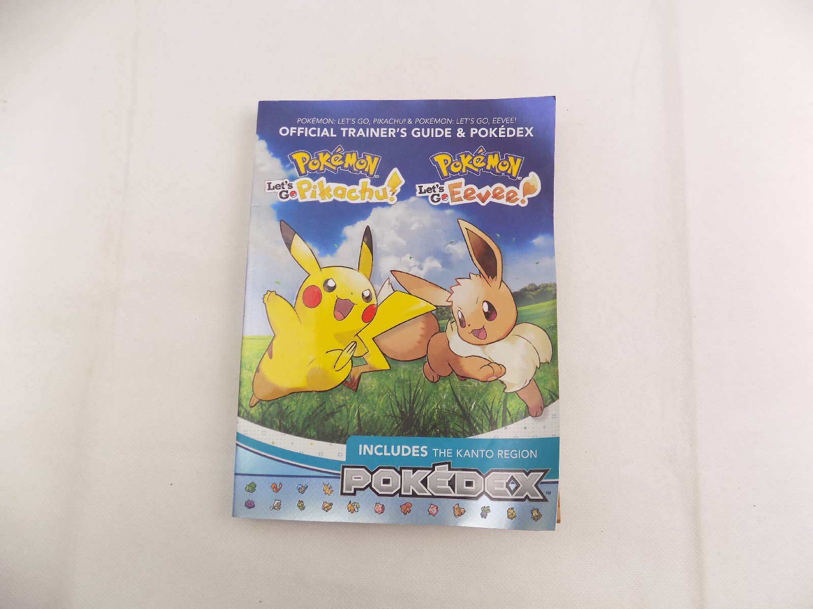 Pokemon Let's Go Pikachu Eevee Official Trainer's Guide and Pokedex