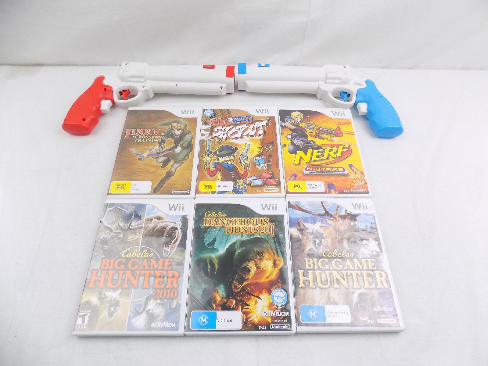 Nintendo Wii Shooting Bundle x2 Gun Attachments And x6 Games