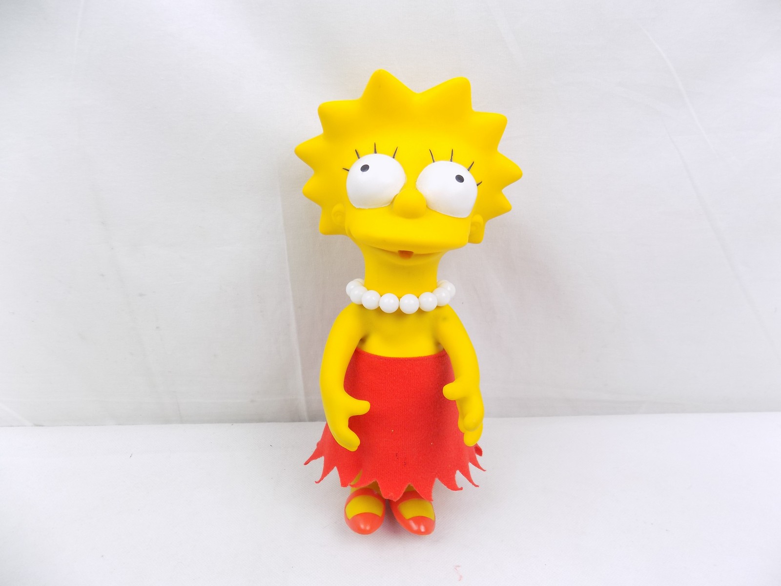 Lisa Simpson Plastic Doll Missing Saxaphone - Starboard Games