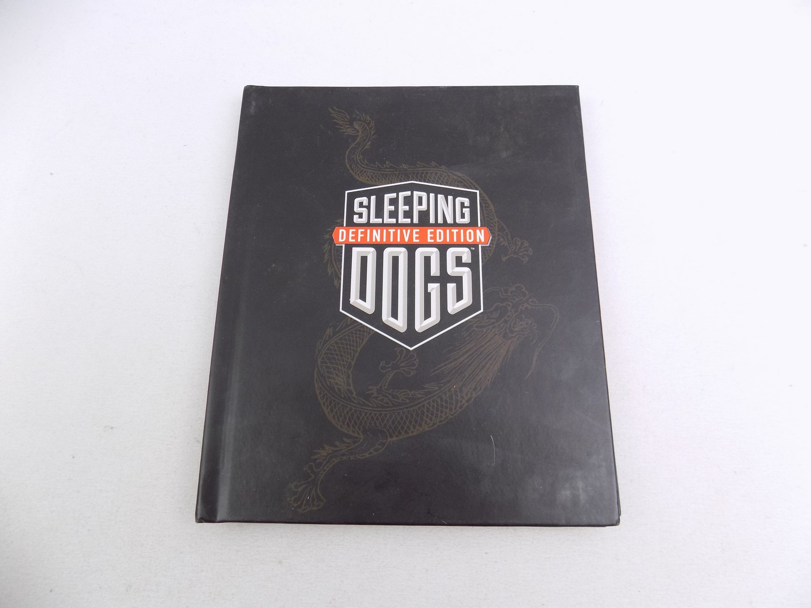 Sleeping Dogs Definitive Edition Hardcover Book - Starboard Games