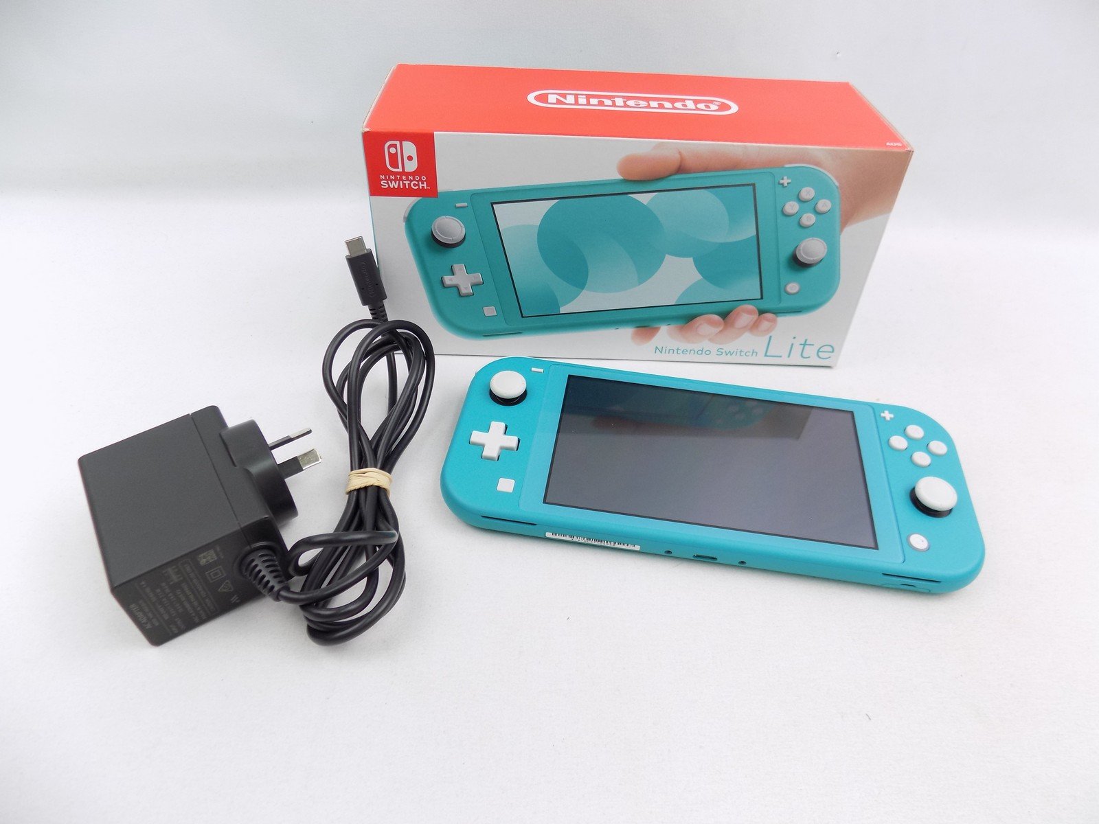 Like New Boxed Nintendo Switch Lite Handheld Console Turquiose With Charger