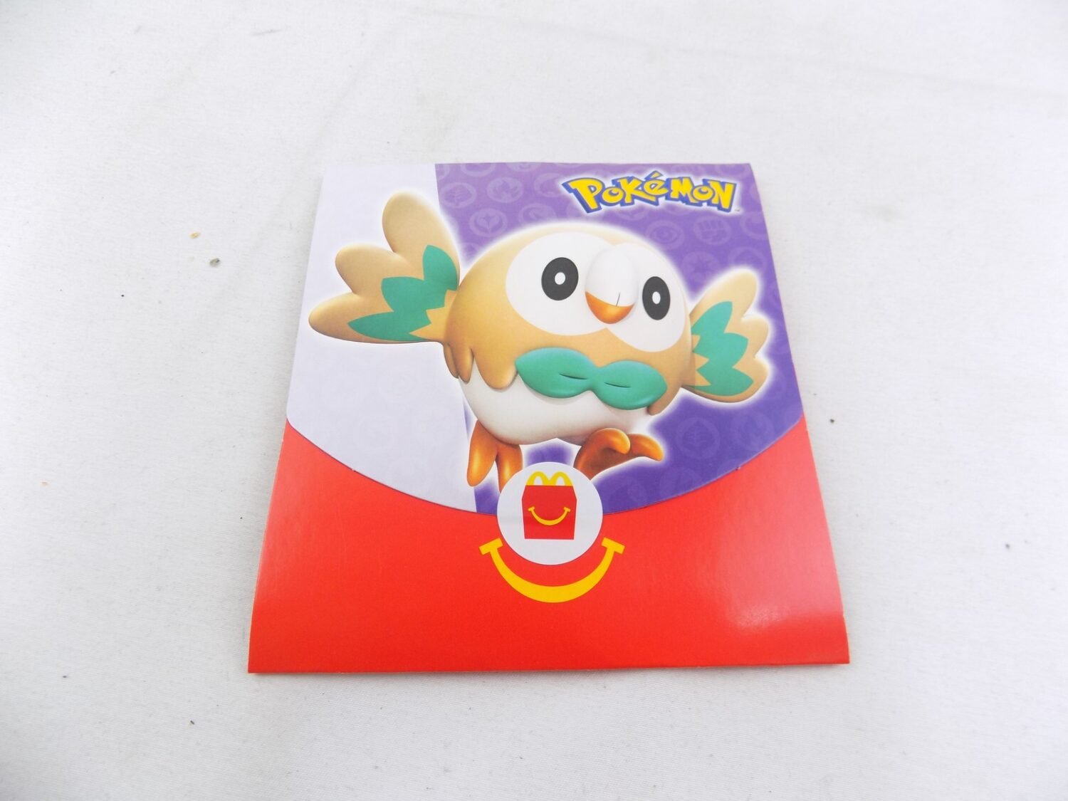 rowlet pokemon card mcdonalds Rowlet Holo McDonalds 25th Anniversary 7/25, NM Pokemon Card main image 0