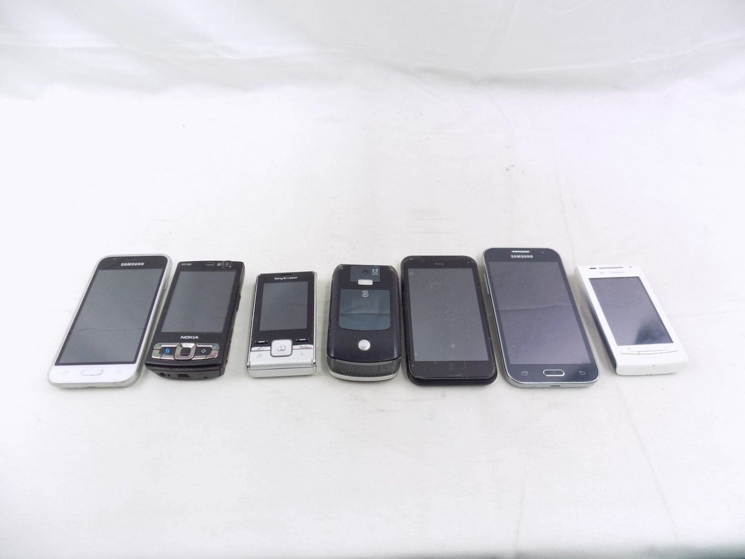 Assorted Phone Bundle (Erricson, Samsung, Nokia, HTC) of x7