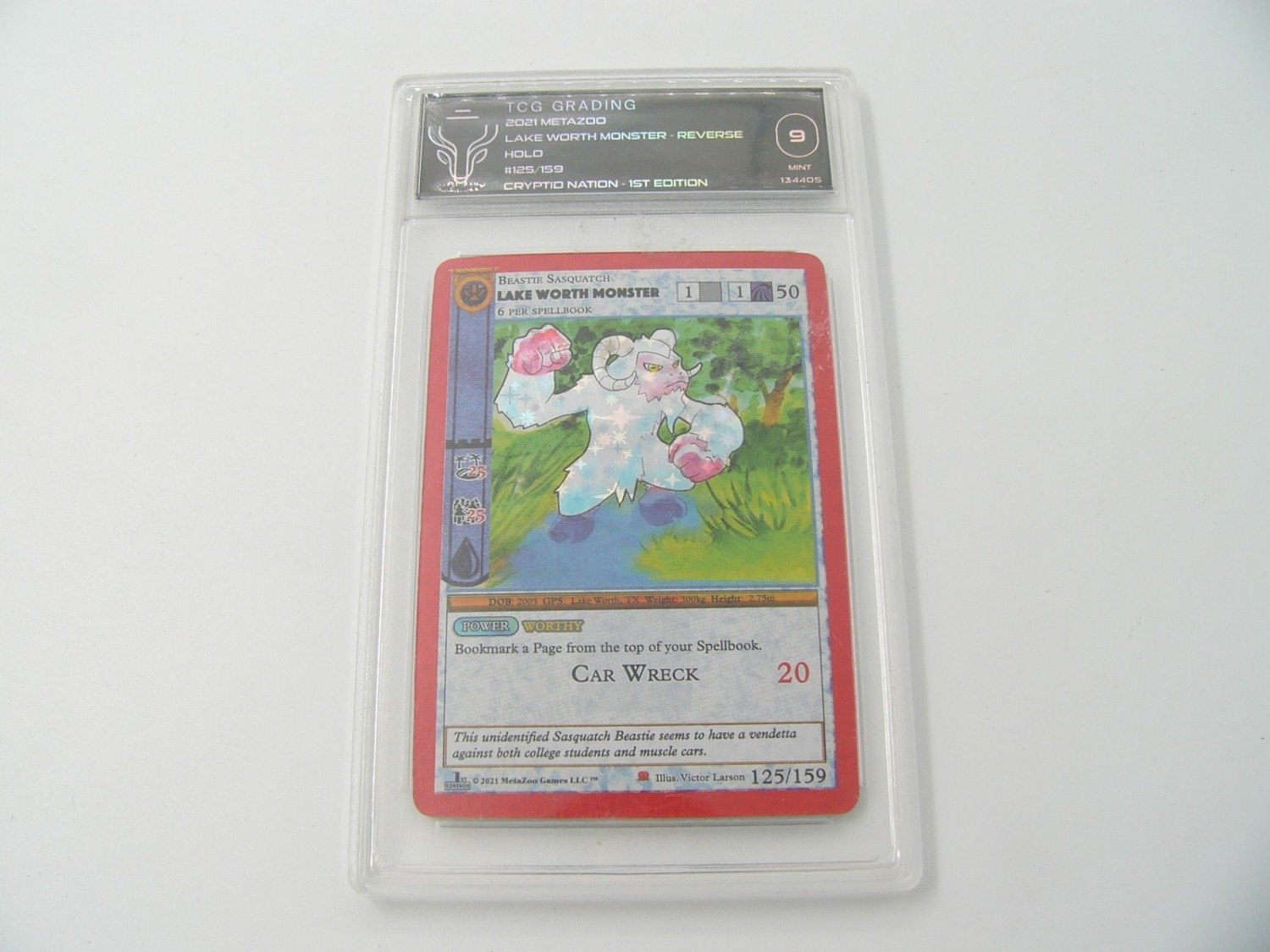 Like New TCG Graded Metazoo TCG Lake Worth Monster 125/159 (9.0)