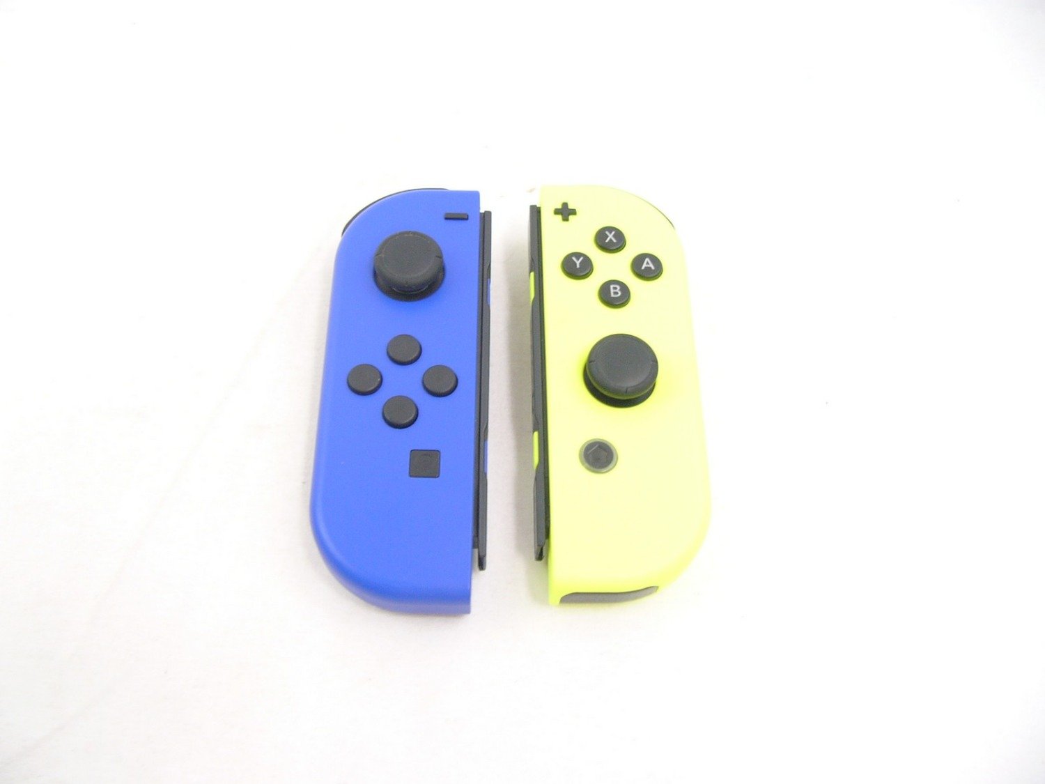 Nintendo Switch Blue and Neon Yellow Joycon Controller Pair