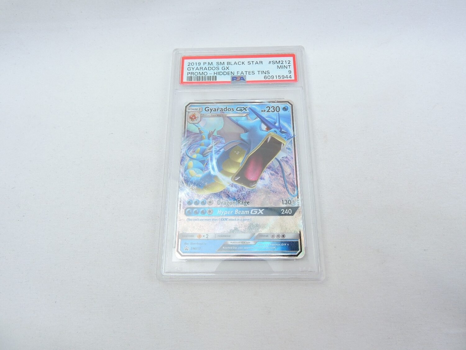 Like New PSA Graded Pokemon TCG Gyarados GX Black Star Promo SM212 (9.0)