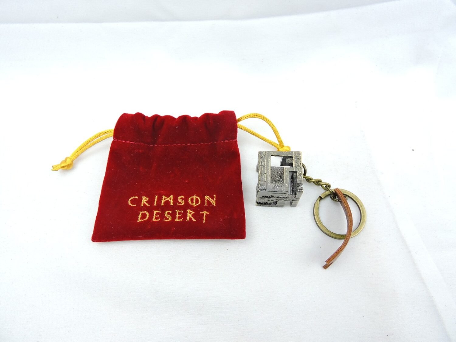 Like New Crimson Desert Abyss Artifact Collector's Keychain